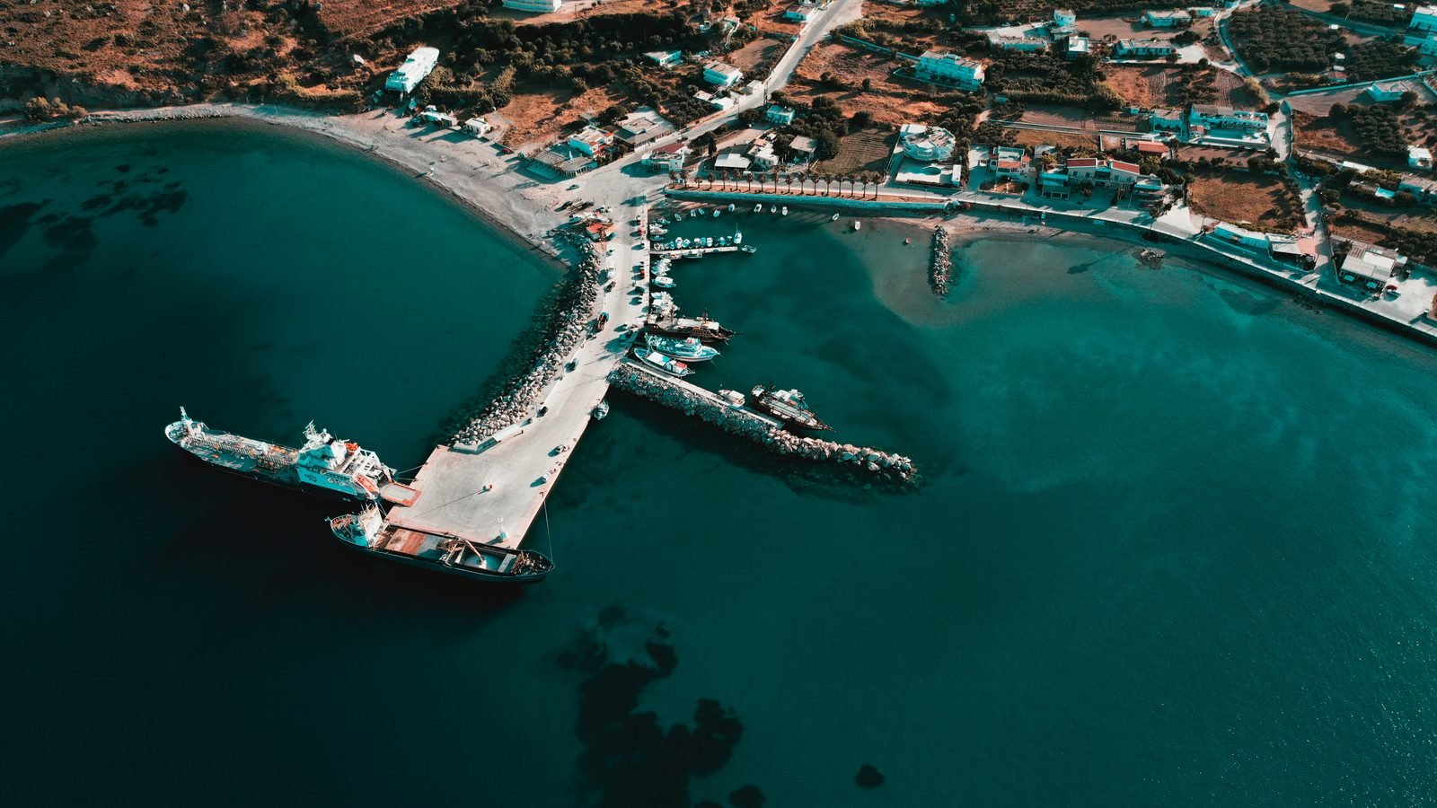 Boats moored at the jetties of Kefalos harbour on Kos, seen from above