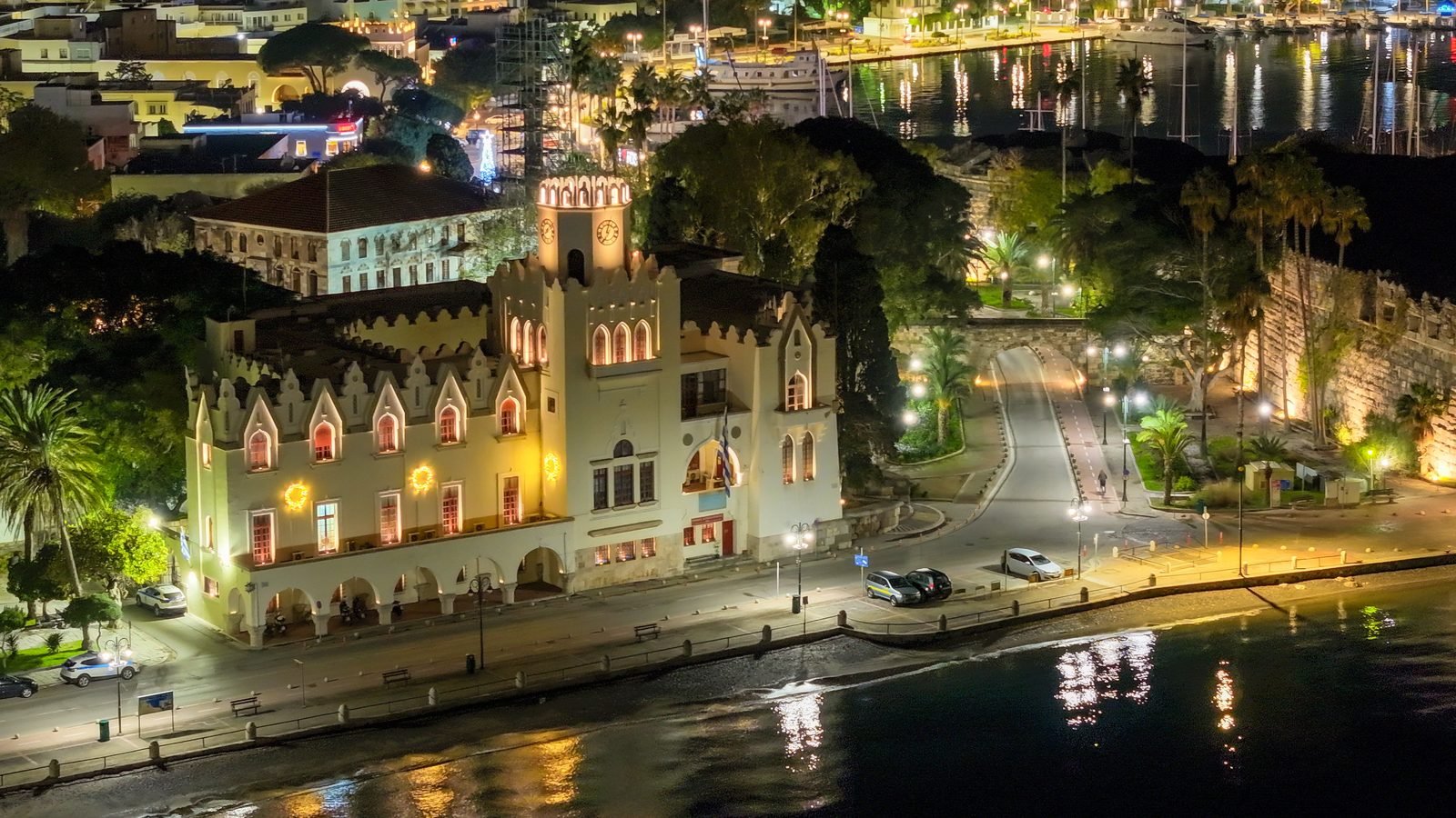 The harbour front of Kos Town lit up in the evening